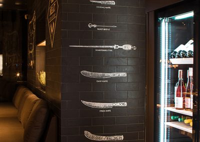 Meat knifes on wall